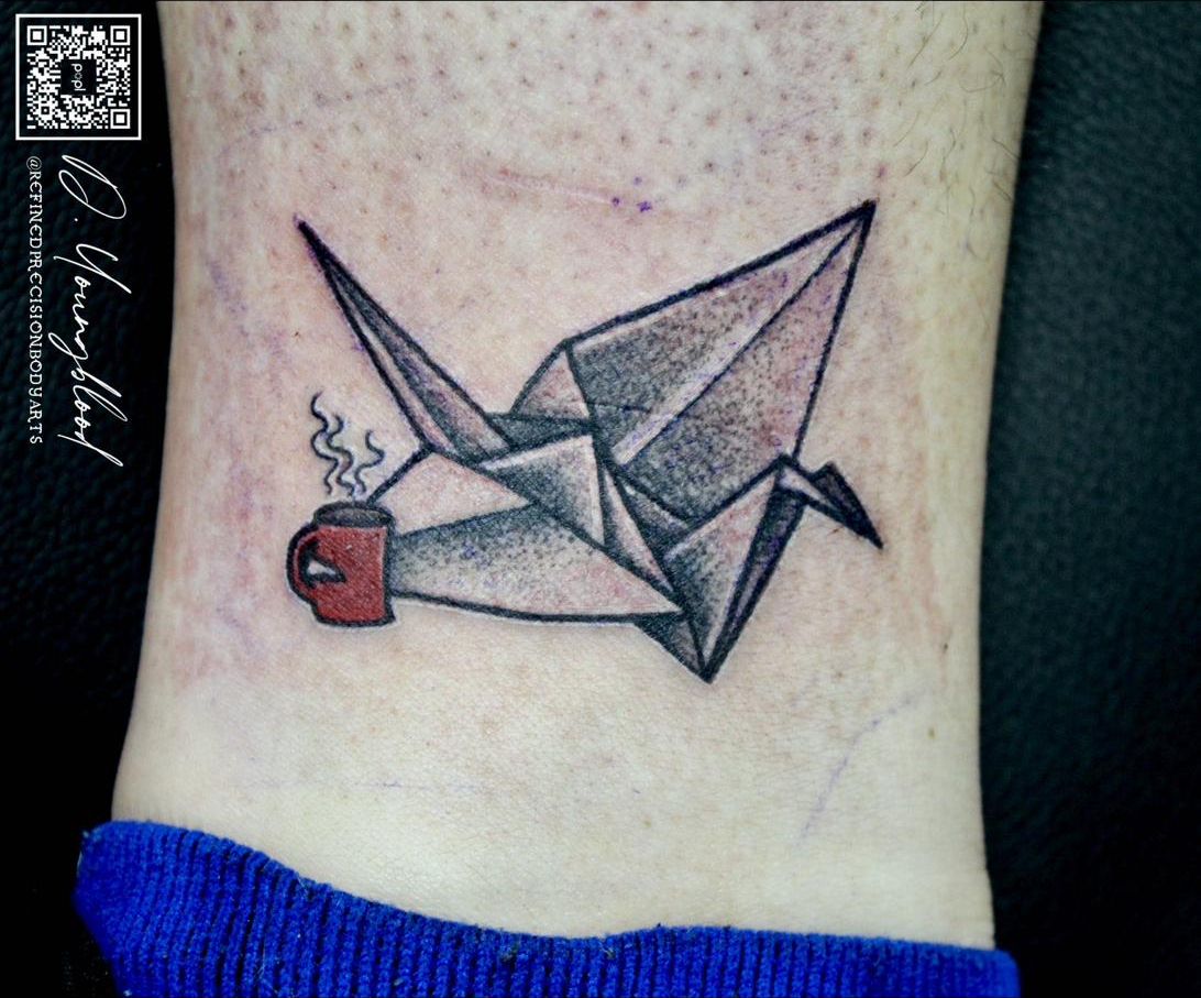 Origami crane and coffee